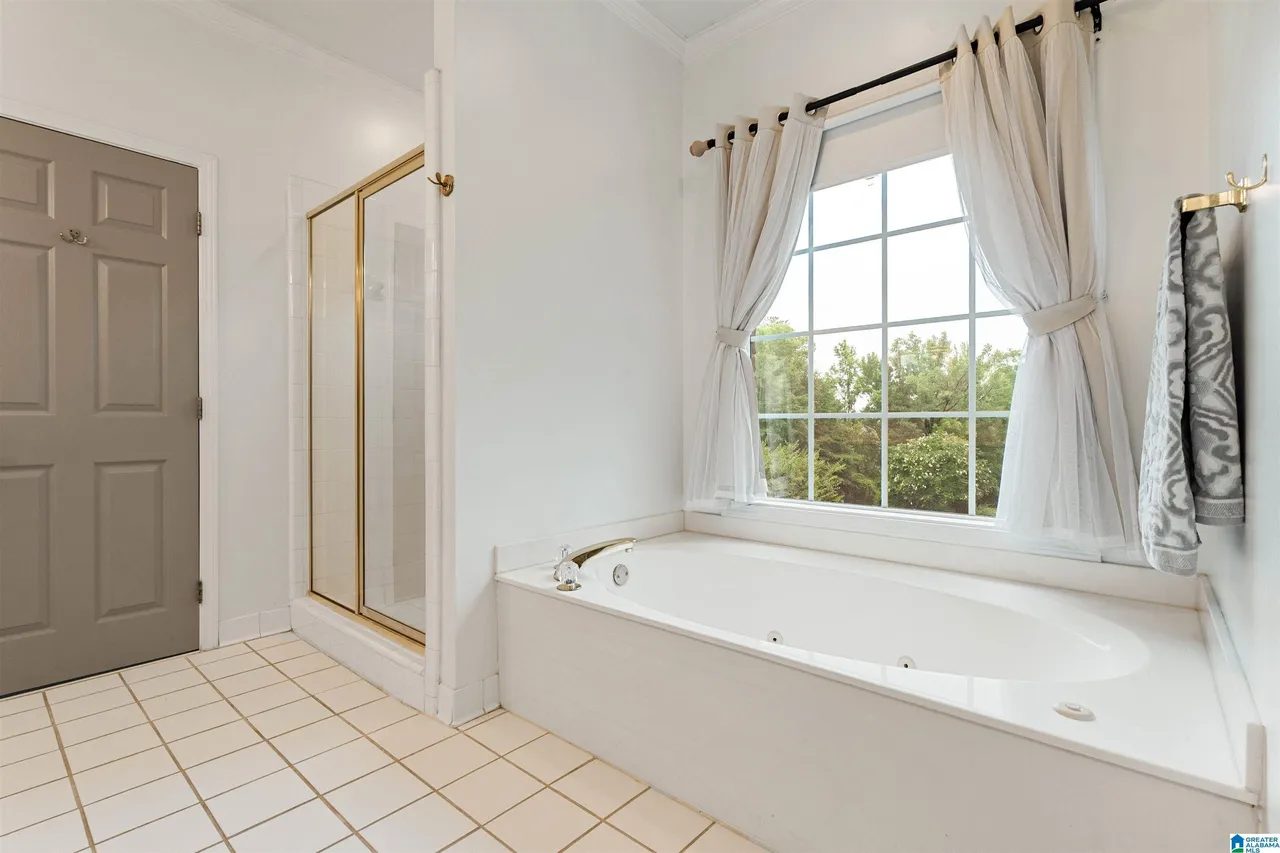 Primary bathroom with garden tub and separate shower